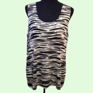 Chico's black and white sleeveless top. A bit of silver shimmer. Size 3.